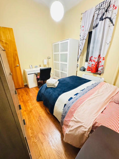 Private room in Manhattan near Central Park and the 1, B, and C trains.
